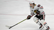 Mar 21, 2024; Anaheim, California, USA; Chicago Blackhawks center Connor Bedard (98) handles the puck in the first period against the Anaheim Ducks at Honda Center. Mandatory Credit: Jayne Kamin-Oncea-Imagn Images