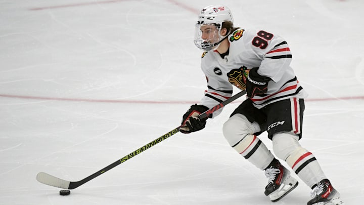 Mar 21, 2024; Anaheim, California, USA; Chicago Blackhawks center Connor Bedard (98) handles the puck in the first period against the Anaheim Ducks at Honda Center. Mandatory Credit: Jayne Kamin-Oncea-Imagn Images