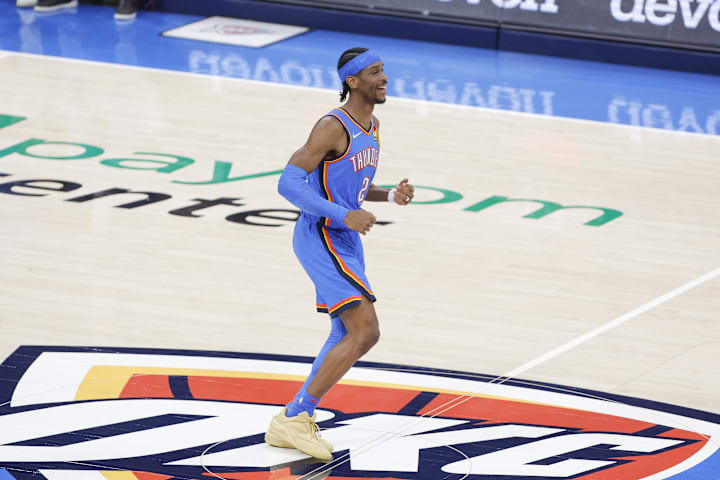 Oklahoma City Thunder guard Shai Gilgeous-Alexander smiles after scoring against the Los Angeles Lakers.