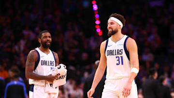 Dec 27, 2024; Phoenix, Arizona, USA; Dallas Mavericks guard Kyrie Irving (11) and Klay Thompson (31) against the Phoenix Suns at Footprint Center. Mandatory Credit: Mark J. Rebilas-Imagn Images