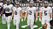 Austin Vandegrift's captains walk to midfield during the 6A DII UIL Texas State Football Championship game against Southlake Carroll on Saturday, December 21, 2024 at AT&T Stadium in Arlington. The Vipers are in the quarterfinals this year again. 