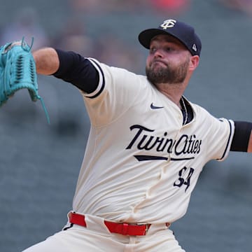 Jun 22, 2025; Minneapolis, Minnesota, USA; Minnesota Twins pitcher Danny Coulombe (54) pitches against the Milwaukee Brewers in the first inning at Target Field.