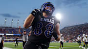 Kansas Jayhawks tight end Boden Groen (88) runs the ball in for a touchdown during the second half of the game against West Virginia Mountaineers at David Booth Kansas Memorial Stadium on Sept. 20, 2025.