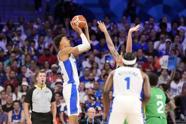 France power forward Victor Wembanyama (32) shoots against Brazil during the Paris 2024 Olympic Summer Games. 