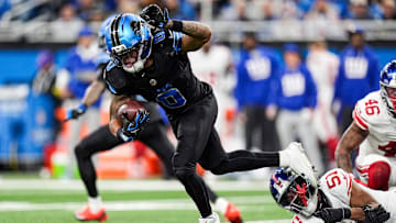 Detroit Lions running back Jahmyr Gibbs (0) runs against New York Giants during the first half at Ford Field in Detroit on Sunday, Nov. 23, 2025.