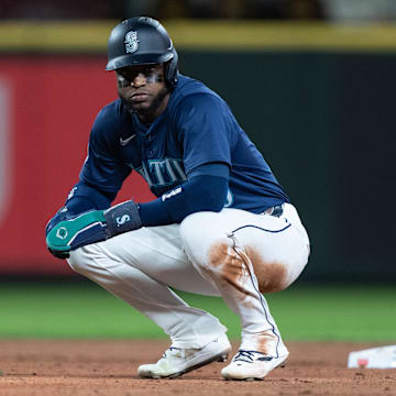 Seattle Mariners right fielder Victor Robles reacts after an inning-ending double play during a game against the San Diego Padres on Tuesday at T-Mobile Park.