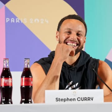 Jul 25, 2024; Paris, France; USA basketball players Stephen Curry and Kevin Durant talk to the media during a press conference. Mandatory Credit: Kirby Lee-USA TODAY Sports