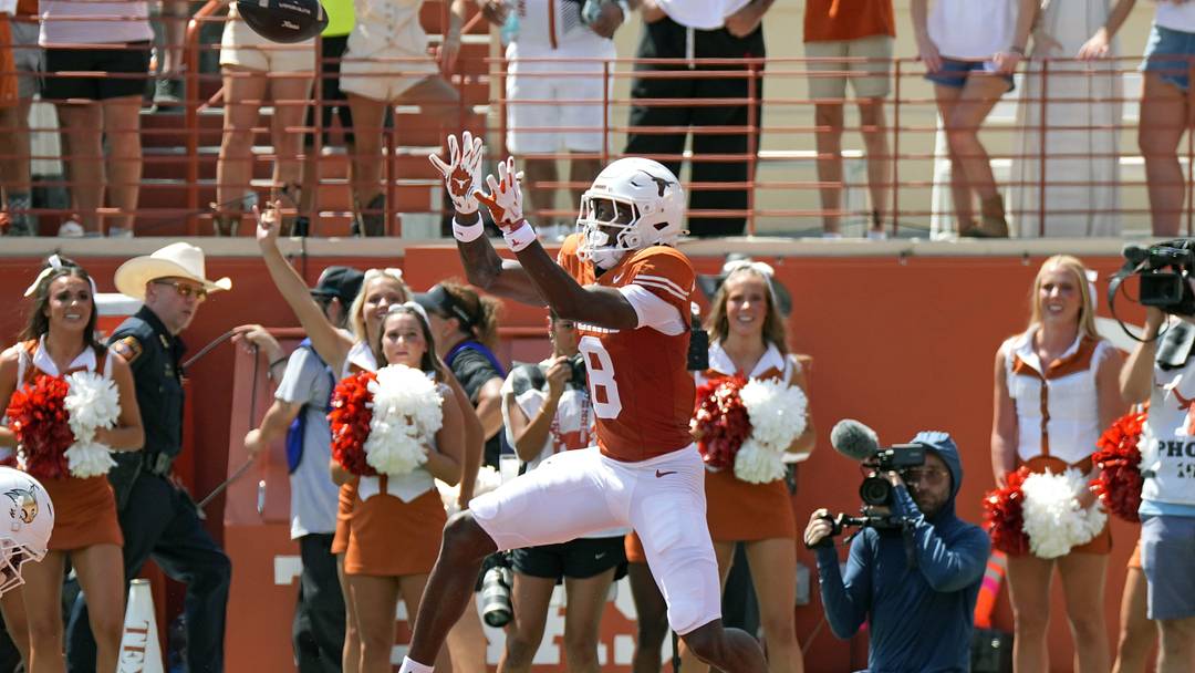 Texas Longhorns wide receiver Cam Coleman (8) catches a pass for a touchdown during the first quarter against the Texas State Bobcats at Darrell K Royal-Texas Memorial Stadium. Mandatory Credit: Scott Wachter-Imagn Images Texas Longhorns wide receiver Cam Coleman (8) catches a pass for a touchdown during the first quarter against the Texas State Bobcats at Darrell K Royal-Texas Memorial Stadium. Mandatory Credit: Scott Wachter-Imagn Images
