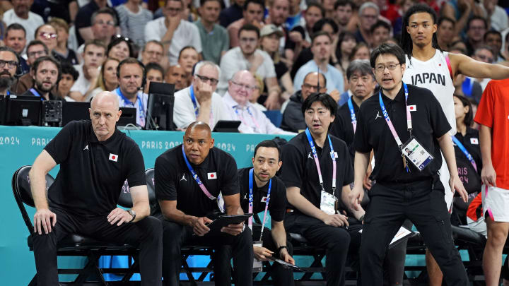 Jul 30, 2024; Villeneuve-d'Ascq, France; Japan head coach Tom Hovasse and the Japan bench look on during the game against Japan in men’s basketball group B play during the Paris 2024 Olympic Summer Games at Stade Pierre-Mauroy.