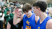 Greenfield-Central Cougars Braylon Mullins celebrates with teammates