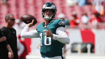 Philadelphia Eagles quarterback Tanner McKee (16) warms up before the game against the Tampa Bay Buccaneers at Raymond James Stadium.