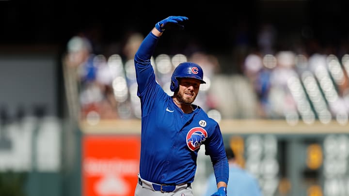 Chicago Cubs first baseman Michael Busch (29) gestures as he rounds the bases on a solo home run in the seventh inning against the Colorado Rockies at Coors Field on Sept 15.