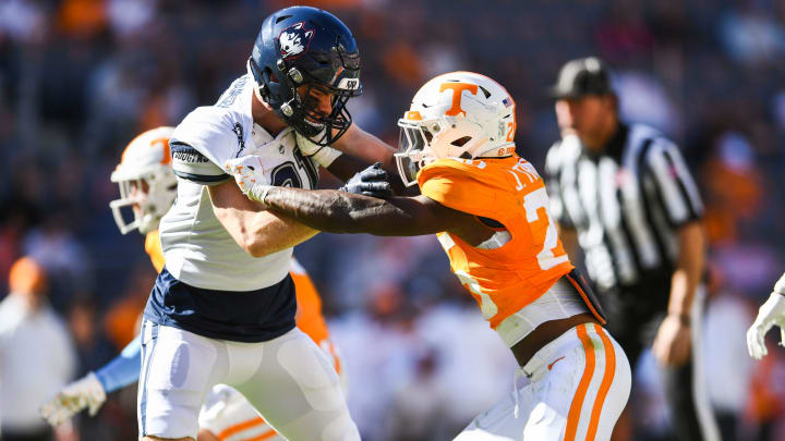 Tennessee defensive back Jourdan Thomas (25) blocks a UConn football player during the Tennessee football game against UConn at Neyland Stadium in Knoxville, Tenn., on Saturday, Nov. 4, 2023.