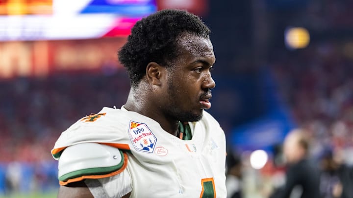 Jan 8, 2026; Glendale, AZ, USA; Miami Hurricanes defensive lineman Rueben Bain Jr. (4) against the Mississippi Rebels during the 2026 Fiesta Bowl and semifinal game of the College Football Playoff at State Farm Stadium. Mandatory Credit: Mark J. Rebilas-Imagn Images