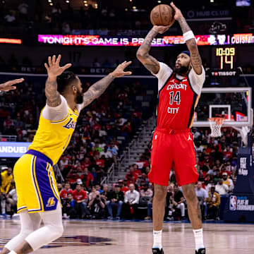 Apr 16, 2024; New Orleans, Louisiana, USA; New Orleans Pelicans forward Brandon Ingram (14) shoots a jump shot against the Los Angeles Lakers during the first half of a play-in game of the 2024 NBA playoffs at Smoothie King Center. Mandatory Credit: Stephen Lew-Imagn Images