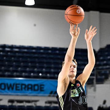 Apr 1, 2024; Houston, TX, USA;  McDonald's All American East forward Liam McNeeley shoots in the three point competition during the 2024 McDonalds High School All American Powerade Jamfest at Delmar Fieldhouse. Mandatory Credit: Maria Lysaker-Imagn Images