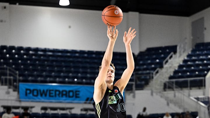 Apr 1, 2024; Houston, TX, USA;  McDonald's All American East forward Liam McNeeley shoots in the three point competition during the 2024 McDonalds High School All American Powerade Jamfest at Delmar Fieldhouse. Mandatory Credit: Maria Lysaker-Imagn Images