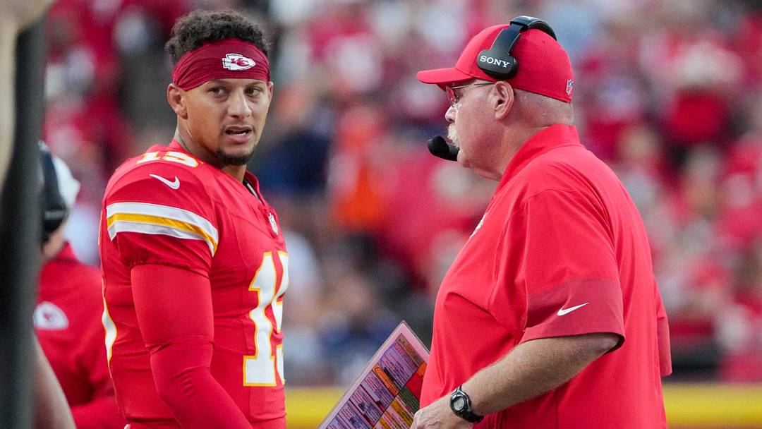 Aug 22, 2025; Kansas City, Missouri, USA; Kansas City Chiefs quarterback Patrick Mahomes (15) talks with head coach Andy Reid after a play against the Chicago Bears during the first half of the game at GEHA Field at Arrowhead Stadium. Mandatory Credit: Denny Medley-Imagn Images