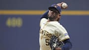 Oct 14, 2025; Milwaukee, Wisconsin, USA; Milwaukee Brewers pitcher Freddy Peralta (51) throws pitch against the Los Angeles Dodgers in the first inning during game two of the NLCS round for the 2025 MLB playoffs at American Family Field. Mandatory Credit: Michael McLoone-Imagn Images