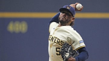 Oct 14, 2025; Milwaukee, Wisconsin, USA; Milwaukee Brewers pitcher Freddy Peralta (51) throws pitch against the Los Angeles Dodgers in the first inning during game two of the NLCS round for the 2025 MLB playoffs at American Family Field. Mandatory Credit: Michael McLoone-Imagn Images