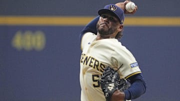 Oct 14, 2025; Milwaukee, Wisconsin, USA; Milwaukee Brewers pitcher Freddy Peralta (51) throws a pitch against the Los Angeles Dodgers in the first inning during game two of the NLCS round for the 2025 MLB playoffs at American Family Field.