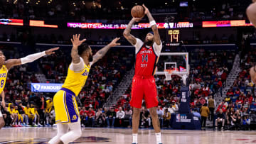 Apr 16, 2024; New Orleans, Louisiana, USA; New Orleans Pelicans forward Brandon Ingram (14) shoots a jump shot against the Los Angeles Lakers during the first half of a play-in game of the 2024 NBA playoffs at Smoothie King Center. Mandatory Credit: Stephen Lew-USA TODAY Sports