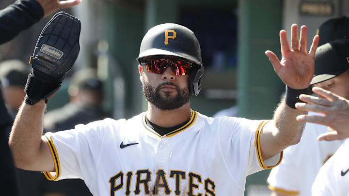 Pittsburgh Pirates shortstop Isiah Kiner-Falefa (7) high-fives in the dugout after scoring a run against the Kansas City Royals during the fifth inning at PNC Park. Pittsburgh Pirates shortstop Isiah Kiner-Falefa (7) high-fives in the dugout after scoring a run against the Kansas City Royals during the fifth inning at PNC Park.