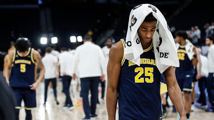 Michigan guard Jace Howard (25) walks off the court after 66-57 loss to Penn State in the First Round of Big Ten tournament at Target Center in Minneapolis, Minn. on Wednesday, March 13, 2024.