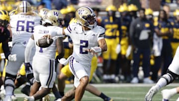 Oct 18, 2025; Ann Arbor, Michigan, USA;  Washington Huskies quarterback Demond Williams Jr. (2) passes in the second half against the Michigan Wolverines at Michigan Stadium. Mandatory Credit: Rick Osentoski-Imagn Images