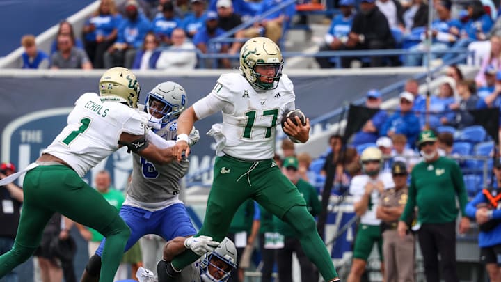 USF quarterback Byrum Brown had 390 total yards and three touchdowns Saturday at Memphis, but the Bulls fell short.