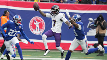 Dec 15, 2024; East Rutherford, New Jersey, USA; Baltimore Ravens wide receiver Rashod Bateman (7) scores a touchdown against the New York Giants in the first half at MetLife Stadium. Mandatory Credit: Robert Deutsch-Imagn Images