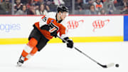 Mar 29, 2025; Philadelphia, Pennsylvania, USA; Philadelphia Flyers right wing Matvei Michkov (39) controls the puck against the Buffalo Sabres in the first period at Wells Fargo Center. Mandatory Credit: Kyle Ross-Imagn Images