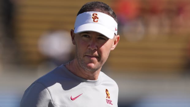 USC Trojans head coach Lincoln Riley walks on the field before a game against the California Golden Bears