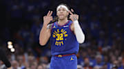 Denver Nuggets forward Aaron Gordon gestures after scoring against the Oklahoma City Thunder.