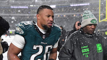 Jan 19, 2025; Philadelphia, Pennsylvania, USA; Philadelphia Eagles running back Saquon Barkley (26) walks off the field after defeating the Los Angeles Rams in a 2025 NFC divisional round game at Lincoln Financial Field. Mandatory Credit: Eric Hartline-Imagn Images
