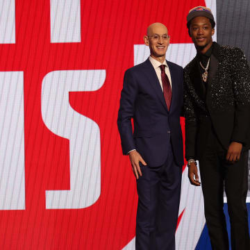 Jun 26, 2024; Brooklyn, NY, USA; Ron Holland II poses for photos with NBA commissioner Adam Silver after being selected in the first round by the Detroit Pistons in the 2024 NBA Draft at Barclays Center. Mandatory Credit: Brad Penner-USA TODAY Sports