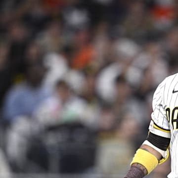 Sep 16, 2024; San Diego, California, USA; San Diego Padres designated hitter Luis Arraez (4) looks on after striking out to end the second inning against the Houston Astros at Petco Park. 