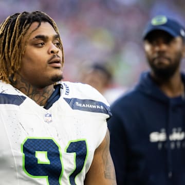 Dec 8, 2024; Glendale, Arizona, USA; Seattle Seahawks defensive tackle Byron Murphy II (91) against the Arizona Cardinals at State Farm Stadium. Mandatory Credit: Mark J. Rebilas-Imagn Images