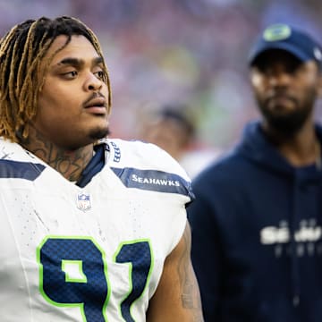 Dec 8, 2024; Glendale, Arizona, USA; Seattle Seahawks defensive tackle Byron Murphy II (91) against the Arizona Cardinals at State Farm Stadium. Mandatory Credit: Mark J. Rebilas-Imagn Images