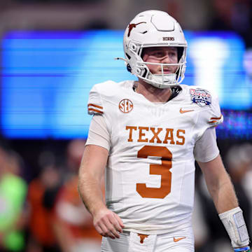 Jan 1, 2025; Atlanta, GA, USA; Texas Longhorns quarterback Quinn Ewers (3) looks on during the first half of the Peach Bowl at Mercedes-Benz Stadium. Mandatory Credit: Brett Davis-Imagn Images