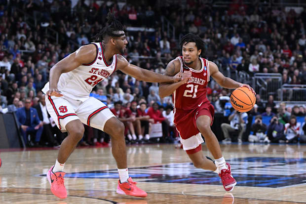 Razorbacks guard D.J. Wagner drives against Red Storm forward Ejiofor.
