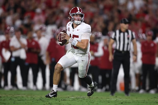 Alabama Crimson Tide quarterback Ty Simpson looks to pass against the Georgia Bulldogs.