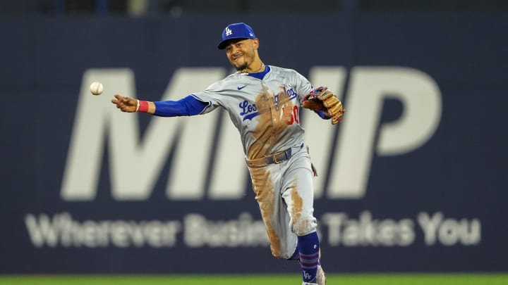 Apr 26, 2024; Toronto, Ontario, CAN;  Los Angeles Dodgers shortstop Mookie Betts (50) throws to