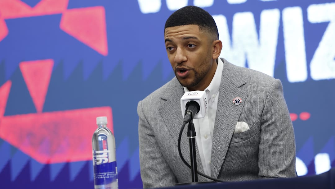 Jan 9, 2026; Washington, District of Columbia, USA; Washington Wizards general manager Will Dawkins introduces newly acquired Wizards guard Trae Young (not pictured) at a press conference prior to the Wizards' game against the New Orleans Pelicans at Capital One Arena. Mandatory Credit: Geoff Burke-Imagn Images Jan 9, 2026; Washington, District of Columbia, USA; Washington Wizards general manager Will Dawkins introduces newly acquired Wizards guard Trae Young (not pictured) at a press conference prior to the Wizards' game against the New Orleans Pelicans at Capital One Arena. Mandatory Credit: Geoff Burke-Imagn Images