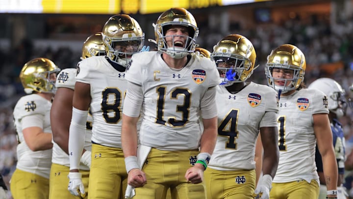 Notre Dame Fighting Irish quarterback Riley Leonard celebrates a touchdown at the Orange Bowl. Notre Dame Fighting Irish quarterback Riley Leonard celebrates a touchdown at the Orange Bowl.
