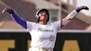 Plano East's Jadyn Dawson celebrates on second base after hitting a double in the bottom of the first inning in a 3-2 win against Trinity in Game 2 of a Class 6A Division I regional semifinal on Friday, May 9, 2025. Dawson started at pitcher and picked up the win after allowing four hits and one earned run with eight strikeouts in seven innings inside the circle.
