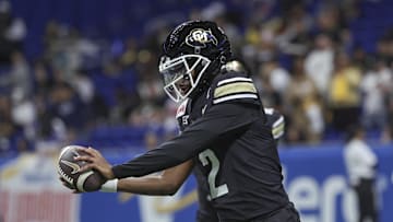 Dec 28, 2024; San Antonio, TX, USA; Colorado Buffaloes quarterback Shedeur Sanders (2) warms up before the game against the Brigham Young Cougars at Alamodome. Mandatory Credit: Troy Taormina-Imagn Images
