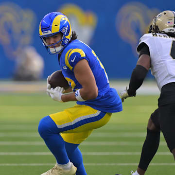 Nov 2, 2025; Inglewood, California, USA; Los Angeles Rams wide receiver Puka Nacua (12) looks to make a move on New Orleans Saints cornerback Kool-Aid McKinstry (4) during the first half at SoFi Stadium. Mandatory Credit: Jayne Kamin-Oncea-Imagn Images