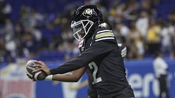 Dec 28, 2024; San Antonio, TX, USA; Colorado Buffaloes quarterback Shedeur Sanders (2) warms up before the game against the Brigham Young Cougars at Alamodome. Mandatory Credit: Troy Taormina-Imagn Images