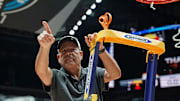 Houston Cougars basketball coach Kelvin Sampson reacts after cutting the net for the Midwest Regional final of the 2025 NCAA tournament at Lucas Oil Stadium.